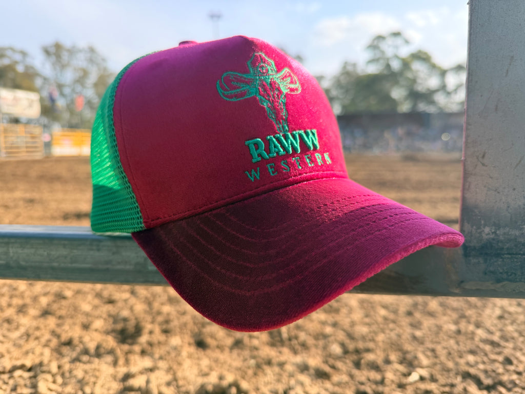 Ruby velvet trucker cap with green mesh back and RAW WES tern embroidery on front
