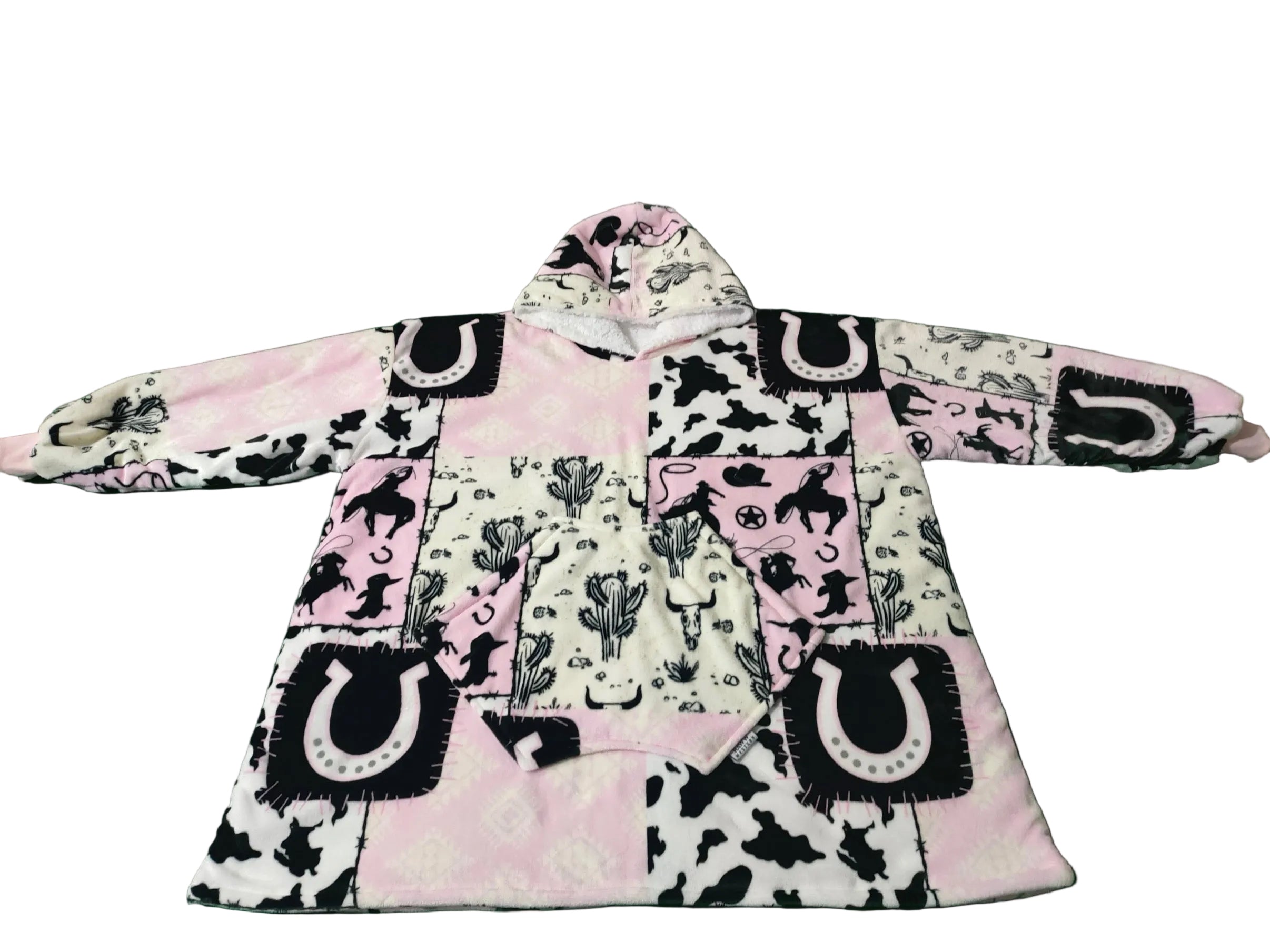Cowgirl print hoodie blanket poncho with wide sleeves and hood, pink and black on white
