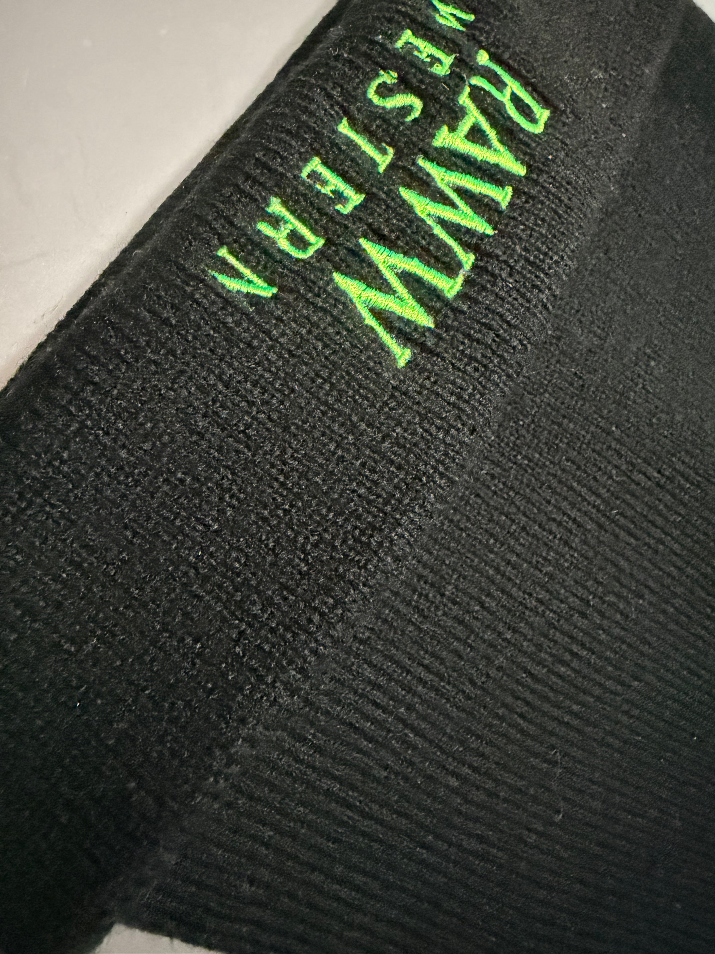 Dark knit beanie with neon green RAW W text logo